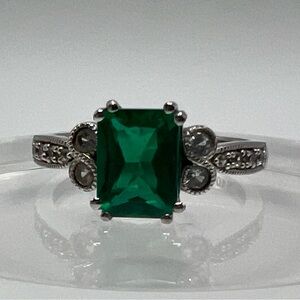 Emerald and diamond ring